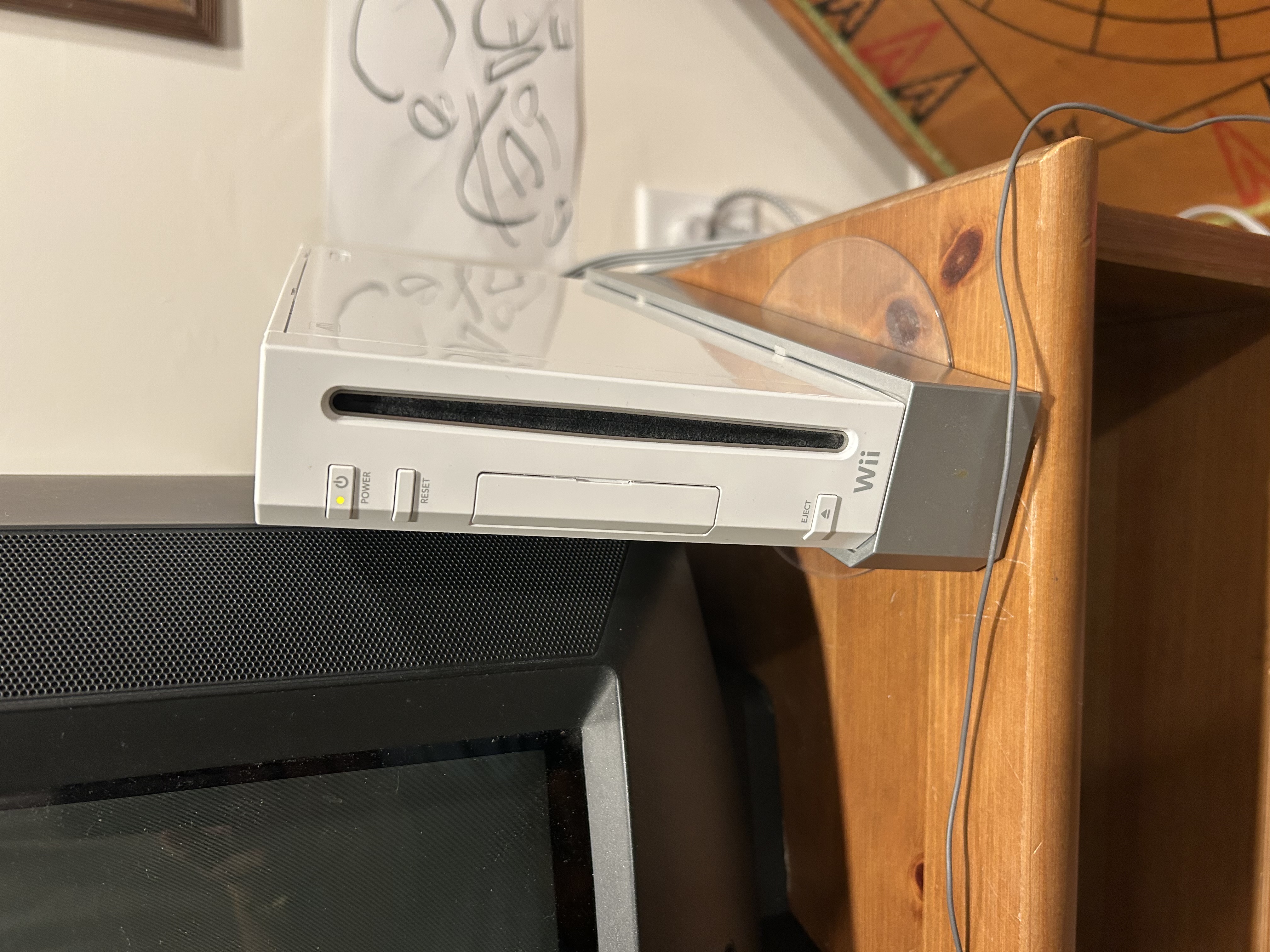 A Nintendo Wii, plugged into a CRT TV.